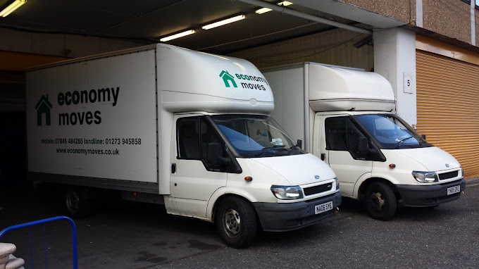 economy moves vans parked